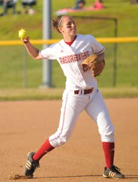 Amie Hubbard warms up at third base. (Photo by Kevin Nagle)