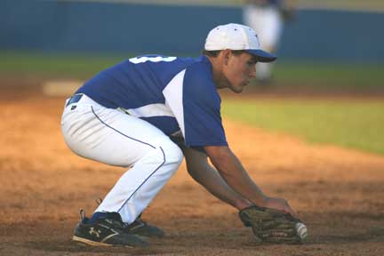 Hunter Mayall fields a ball at third base. (Photo by Rick Nation)