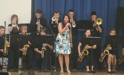 Maria Pinkerton provides vocals as the Bryant High School Jazz Band kicked off the 2009 All-Campus Band Concert Tuesday night. (Photo by Kirk Stewart)