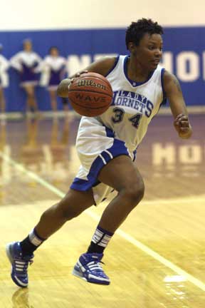 Alana Morris drives upcourt during Friday's game against Mount St. Mary. (Photo by Rick Nation)