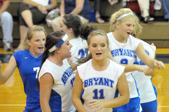 Lady Hornets Lauren Reed (7), Sydney Manley (17), Courtney Davidson (21), Hannah Rice (11), Maggie Hart and McKenzie Rice celebrate a point during a recent match at the Hornets Nest. (Photo by Kevin Nagle)