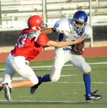 Mar'kevius Nelson (2) tries to evade a Cabot South tacker. (Photo by Kevin Nagle)