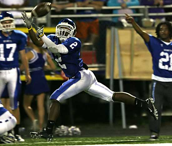 Bryant's Dillon Winfrey hauls in a long pass during Friday's game against Van Buren. (Photo by Rick Nation)