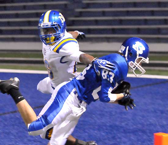 Bryant's Tyler Jamison (83) is forced out of bounds just outside the end zone, setting up the winning touchdown on Monday night. (Photo by Kevin Nagle)