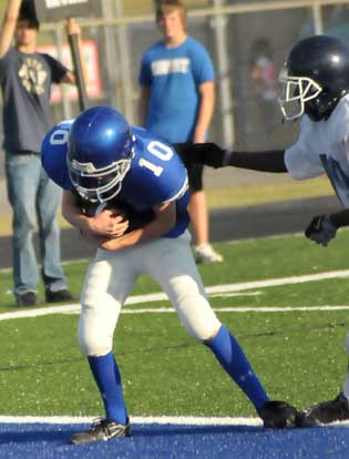 Luke Brantley secures a touchdown catch in front of Conway's Jarius Wright (19). (Photo by Kevin Nagle)