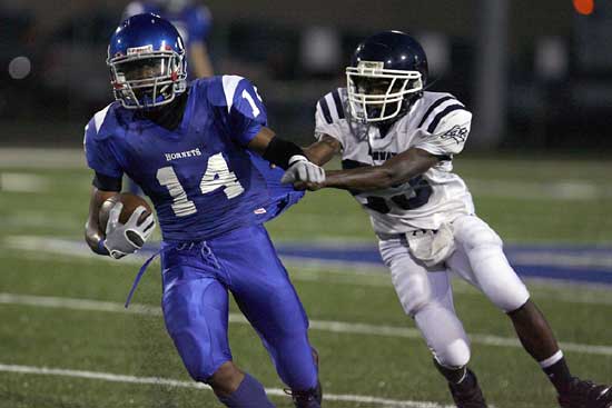 Bryant's Madre London (14) rushed for 139 yards and two touchdowns on just 10 tries. (Photo by Rick Nation)