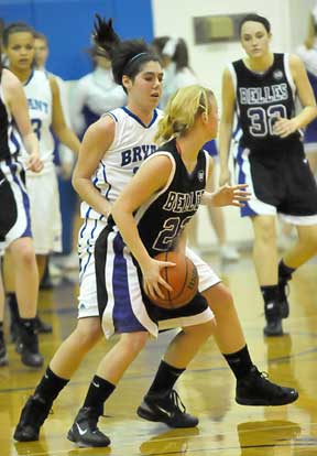 Bryant's London Abernathy, left, guards Mount St. Mary's Annie Stafford. (Photo by Kevin Nagle)