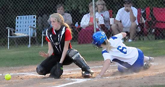Peyton Jenkins (6) slides home ahead of throw to Cabot catcher Taylor Anderson. (Photo by Kevin Nagle)
