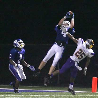 Bryant's Jesse Johnson (4) goes high to nearly intercept the final pass of the night. (Photo by Rick Nation)