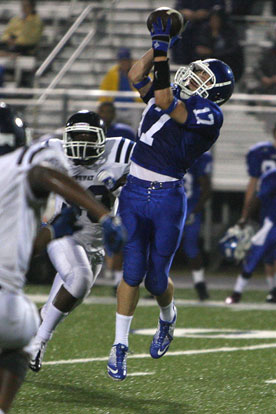 Pierce Finney (17) reaches up to grab a pass for the Bryant freshman team. (Photo by Rick Nation)