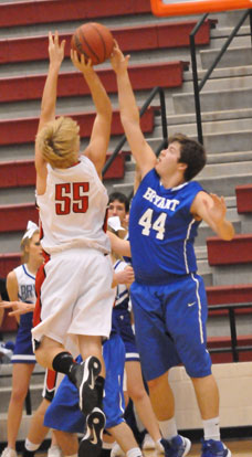 Zach Cambron (44) blocks a shot by Cabot's Brett Frazier. (photo by Kevin Nagle)