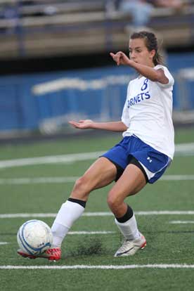 Shelby Gartrell launches the game-winning kick. (PHoto by Rick Nation)