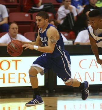 Jordan Griffin pushes the ball up the floor. (Photo by Rick Nation)