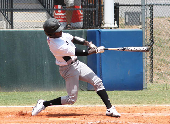 Marcus Wilson follows through on his three-run homer. (Photo by Phil Pickett)