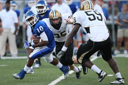 DaVonte Howard (10) looks to turn upfield after a reception. Howard broke the ice on Friday night's game with a 58-yard TD catch and run. (Photo by Rick Nation)