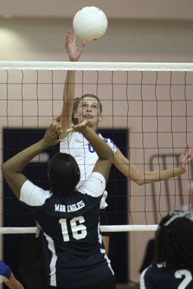 Allie Anderson (6) pounds one of her team-high six kills. (Photo by Rick Nation)