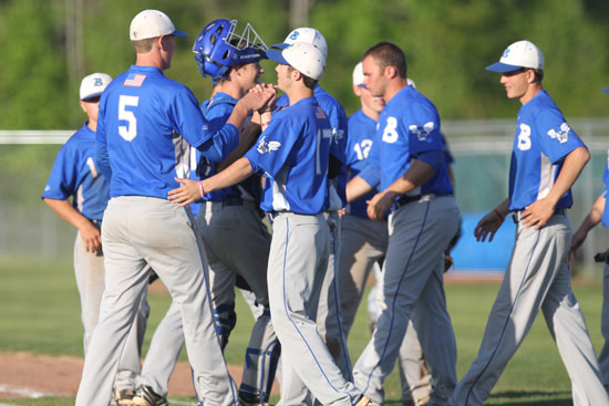 The Bryant Hornets celebrate the final out of Thursday's win over Sheridan. (Photo by Rick Nation)