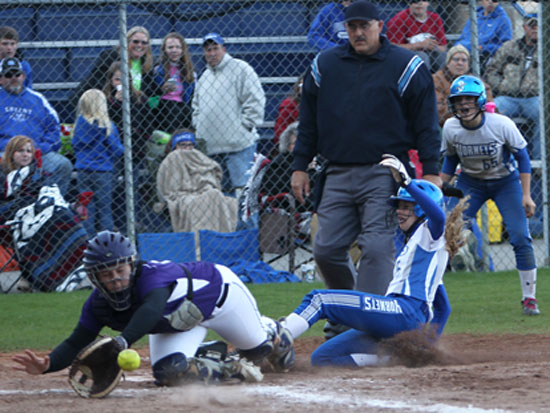 Sierra Jones slides safely home. (Photo by Rick Nation)