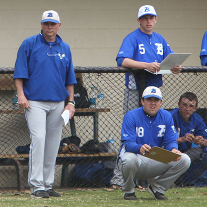 Coach Kirk Bock, left, assistant Travis Queck (18) and senior pitcher Devin Dupree (5). (Photo by Rick Nation)