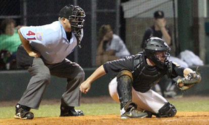 Zach Graddy receives a pitch behind the plate. (Photo by Rick Nation)