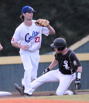 Bryant's Trevor Ezell slides into third with one of his two triples, part of a four-hit night for him. (Photo by Kevin Nagle)