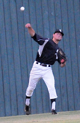 Chase Tucker gets the ball into the infield after chasing down a hit in left-center. (Photo by Kevin Nagle)