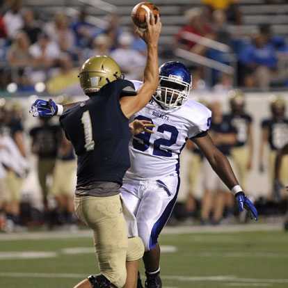 Bryant defensive lineman Mario Waits (92) pressures Pulaski Academy quarterback Will Hefley. (Photo by Rick Nation)