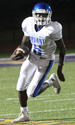 Jaylon Dickson sprints toward the corner on a two-point conversion attempt. (Photo by Rick Nation)