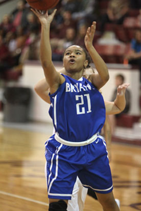 Destiny Martin launches a shot. (Photo by Rick Nation)