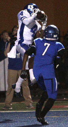 Quinton Royal makes his third interception on the last play of the game. (Photo by Rick Nation)