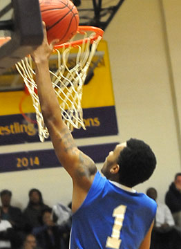 Detavious Moore lays up a shot. (Photo by Kevin Nagle)