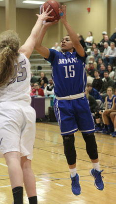 Emily Ridgell (15) fires a shot over Mount St. Mary defender Lizzie Allgood. (Photo by Rick Nation)