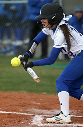 Maddie Stephens gets a bunt down during Thursday's game. (Photo by Rick Nation)