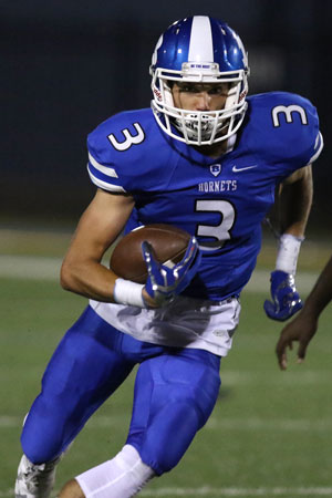 Bryant's Reece Coates rushed four times for 71 yards and caught three passes for 49 yards and a TD Friday night. (Photo by Rick Nation)